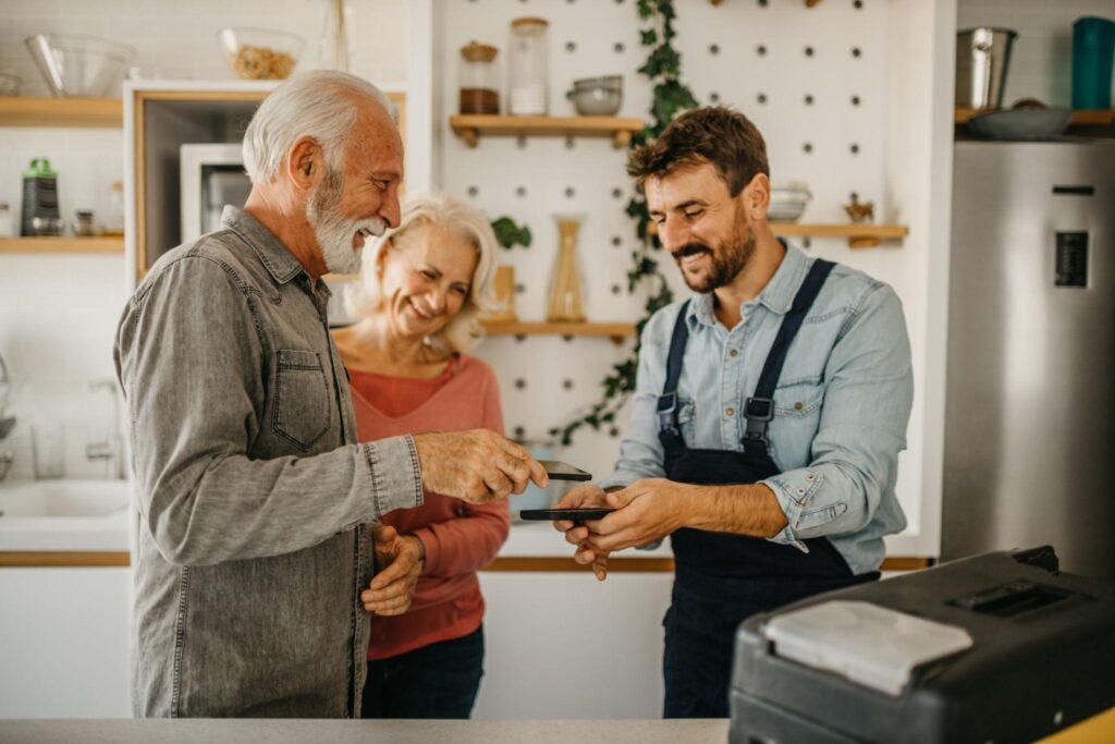 contractor payment processing customer paying on site at home