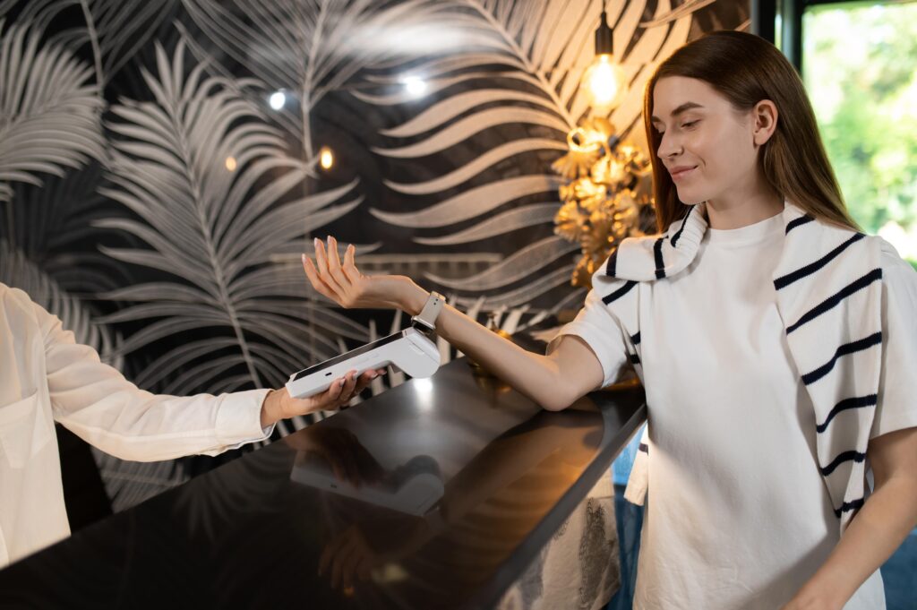 hotel payment processing guest paying at front desk